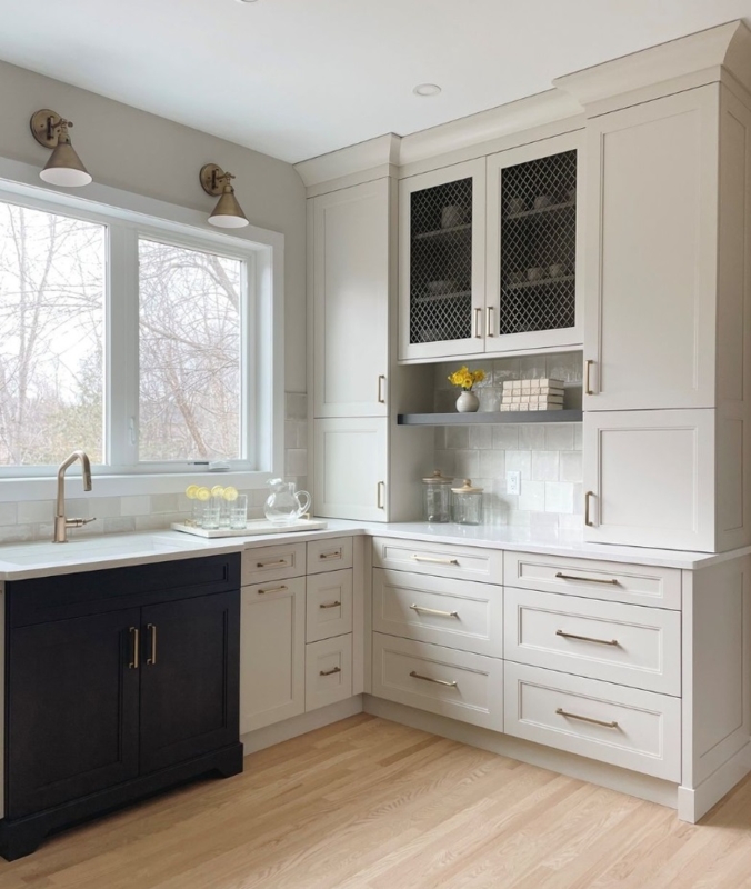 Two-Tone Kitchen Cabinets with Mesh Inserts and Brass Accents (69 characters)