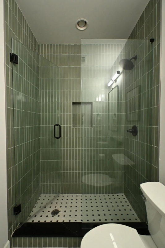 Vertical Stack Shower Tile in Sage Green with Pinwheel Floor