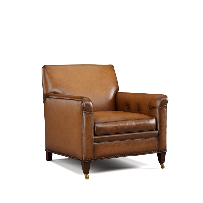 Accent Chair featuring Tufted Inner Arms and Brass Front Casters