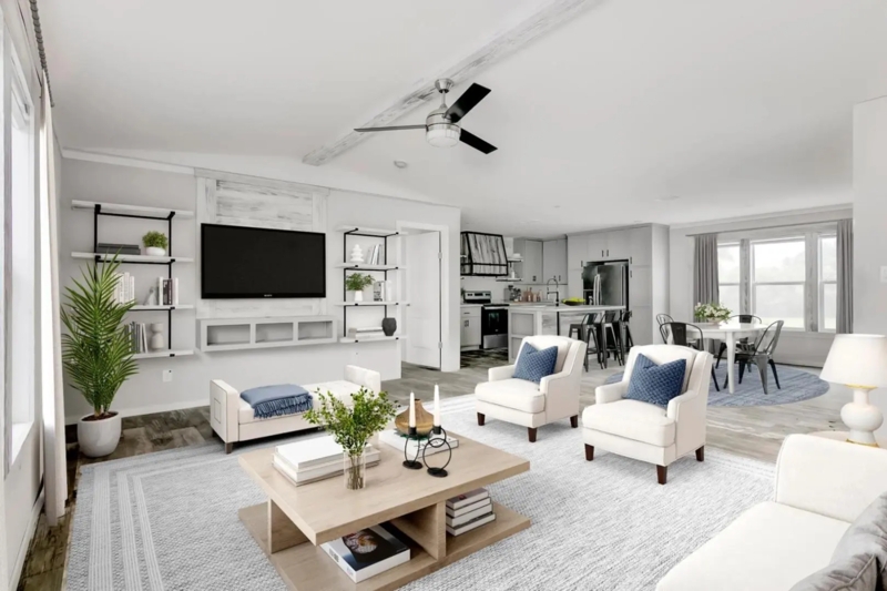 Airy Living Room with Vaulted Ceiling and Navy Blue Accents
