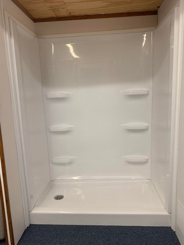 Alcove Shower Stall with Integrated Shelving and Glossy Finish.