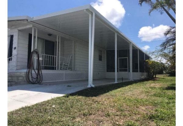 Aluminum Carport Design with Insulated Panels and Screen Room