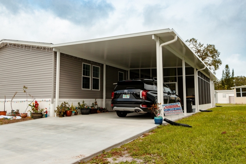 Aluminum Carport with Screened Porch Integration and Flat Roof