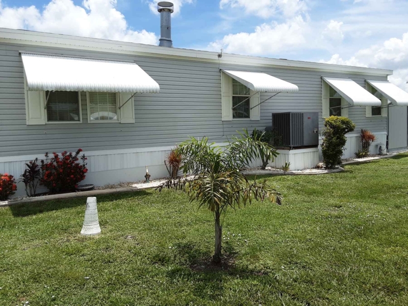 Awning: Clamshell Ribbed Metal for Mobile Home Exterior Updates