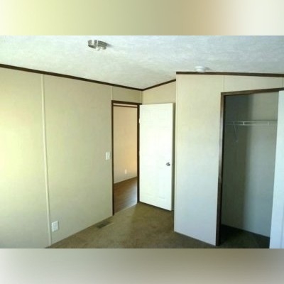 Bedroom Dark Trim Contrast on Beige Wall Panel Seams Traditional