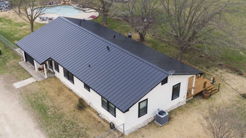Black Standing Seam Metal Roof on Modern Farmhouse Exterior