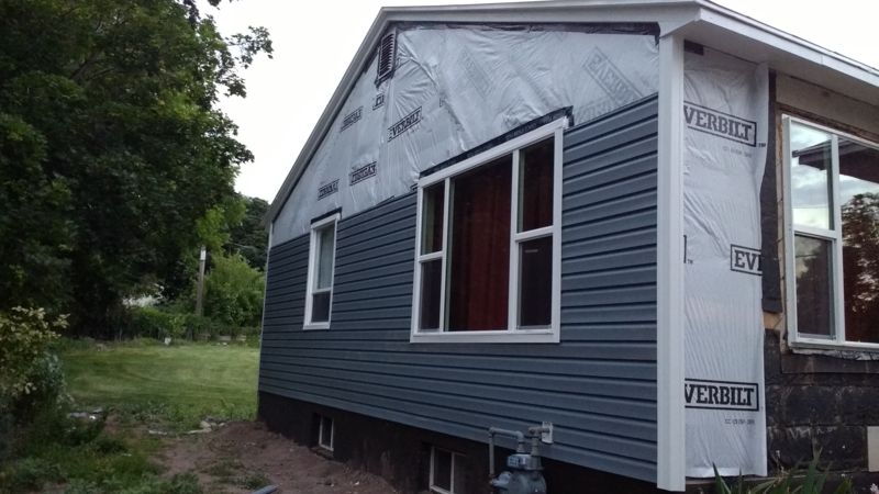 Blue-Gray Horizontal Vinyl Siding Installation Project