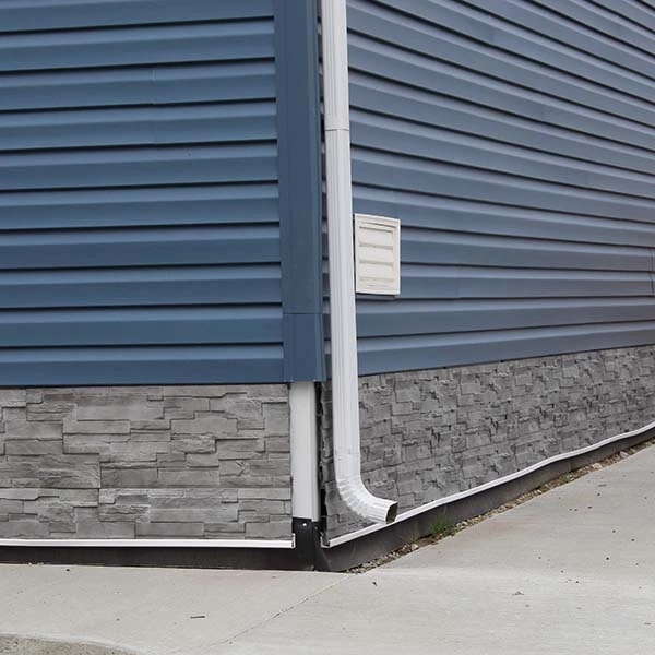 Blue Siding with Stone Skirting: Faux River Rock Foundation Panels