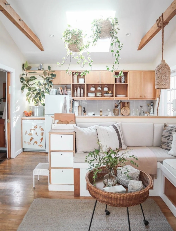 Boho Studio Apartment Layout with Large Skylight and Exposed Beams
