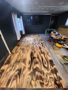Burned Plywood Floor DIY Project with Charcoal Grey Shiplap Walls