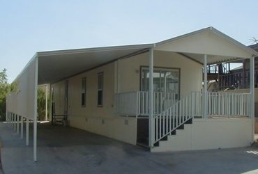 Carport Cream Metal Structure with Integrated Gabled Porch Roof