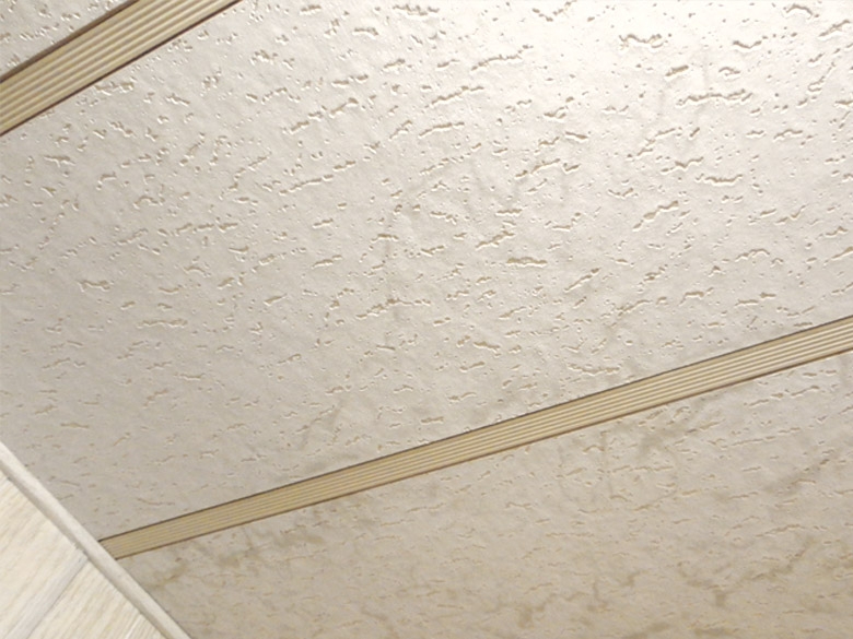 Ceiling Panel: Off-White Pitted Texture with Grooved Batten Trim