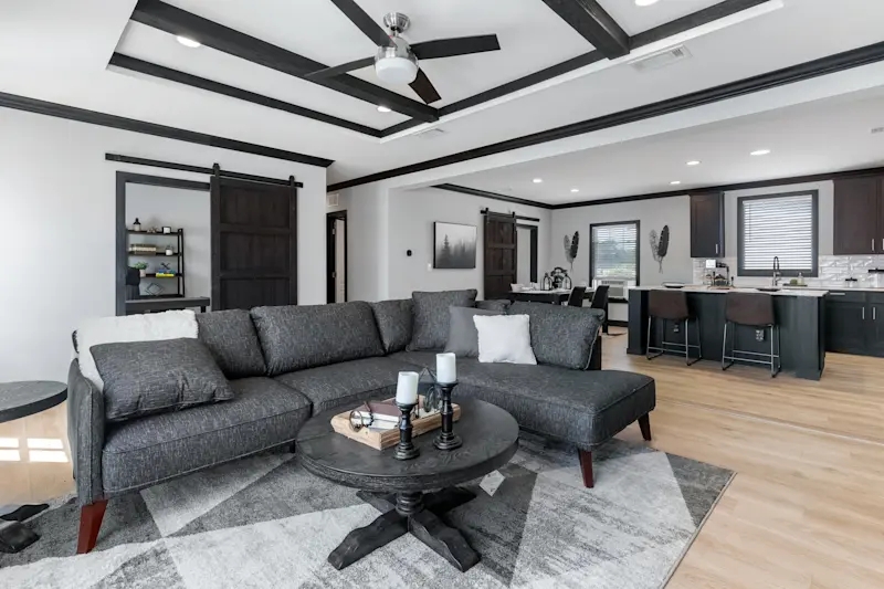 Charcoal Gray Sectional Living Room with Black Coffered Ceiling