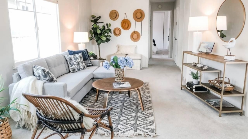 Coastal Boho Living Room: Hat Wall Decor and Rattan Accents