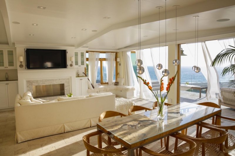 Coastal Living Room with Ocean View and Glass Pendant Lights