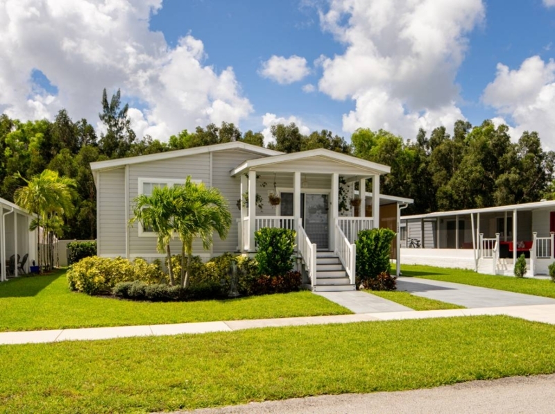 Coastal Manufactured Home Exterior: Gabled Porch with White Railings