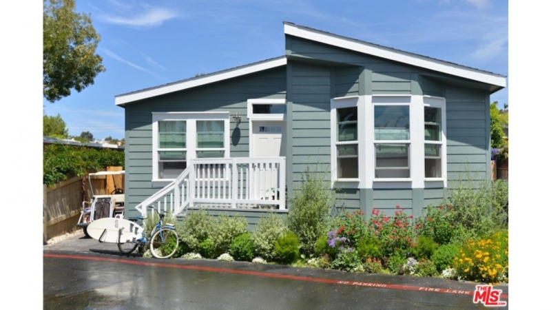 Coastal Mobile Home Remodel with Shed Roof and Blue Gray Siding