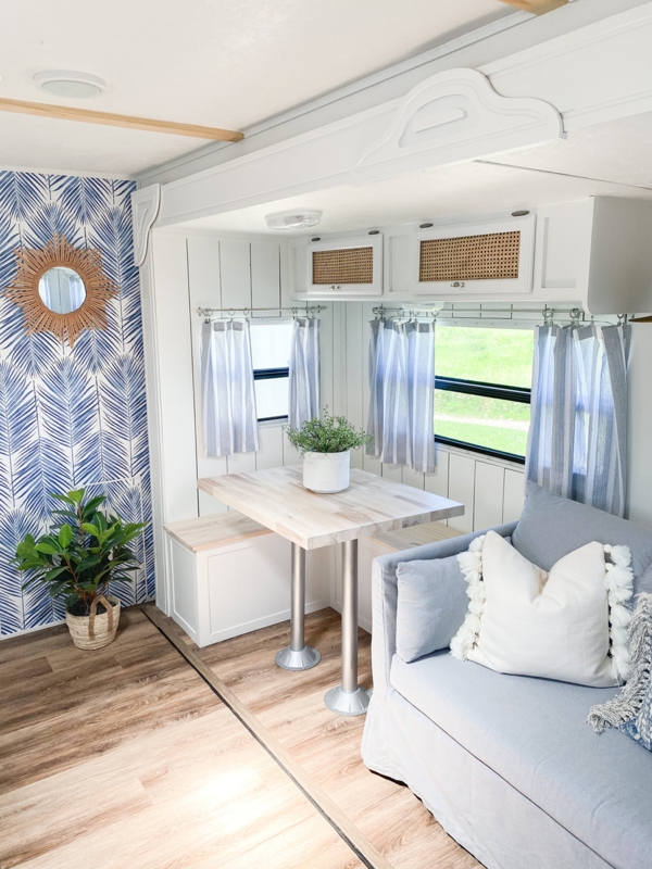 Coastal RV Renovation featuring Palm Leaf Wallpaper and Cane Inserts