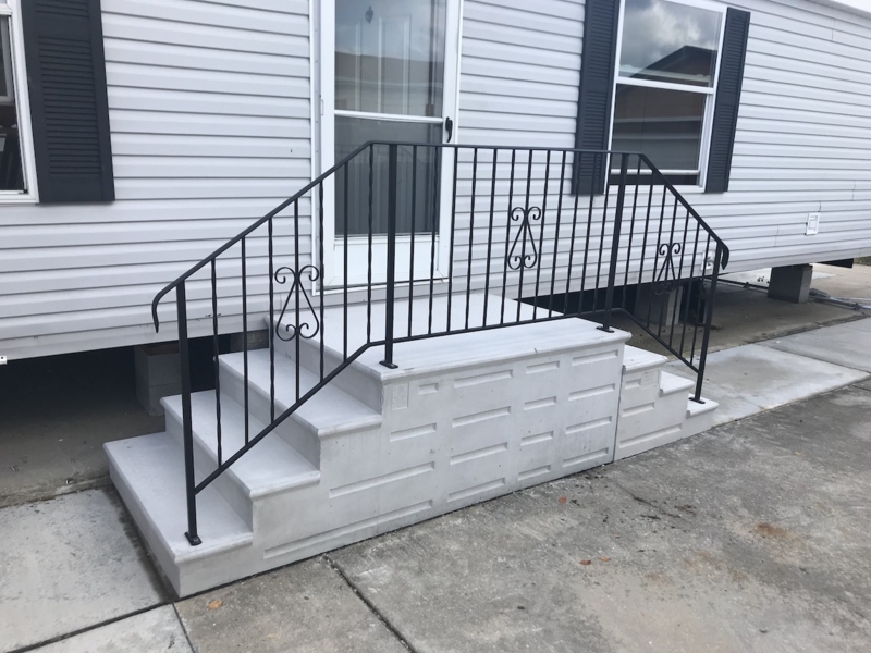 Concrete Steps, Scrollwork Railing with Precast Design for Mobile Home.
