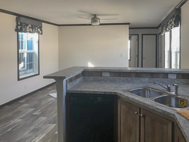 Contemporary Kitchen: Raised Breakfast Bar, Grey Wood Look Flooring