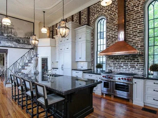Copper Range Hood Centerpiece: Transitional Kitchen with Brick Wall