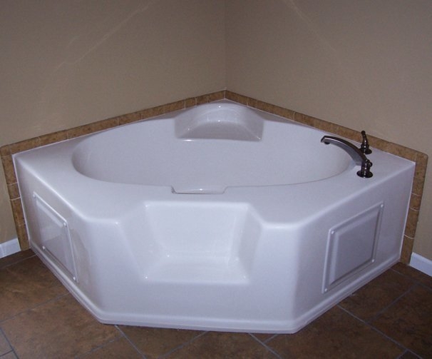 Corner Bathtub with Built-In Seat and Dark Bronze Hardware