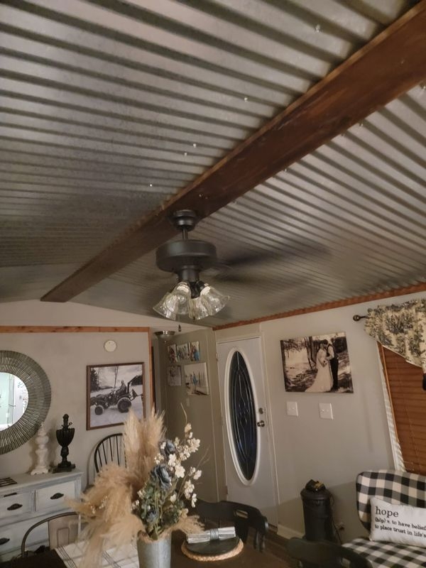 Corrugated Metal Ceiling: Industrial Farmhouse Style with Exposed Beam