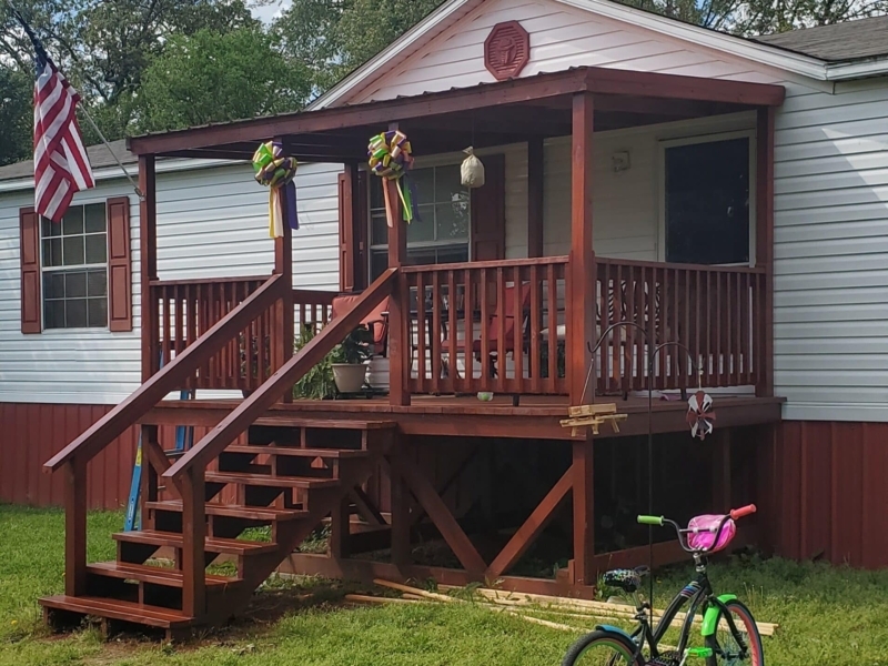 Covered Deck with Wide Steps and Reddish Brown Stain