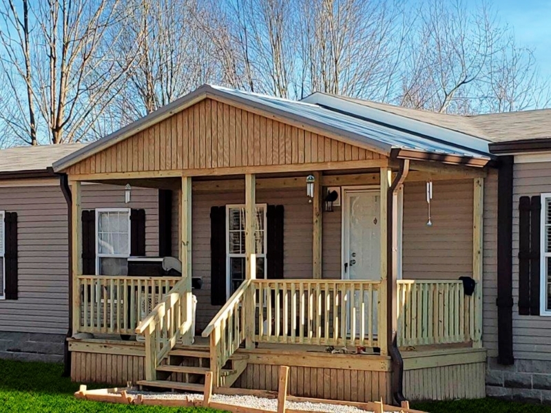 Covered Wooden Porch with Gable Roof and Vertical Skirting