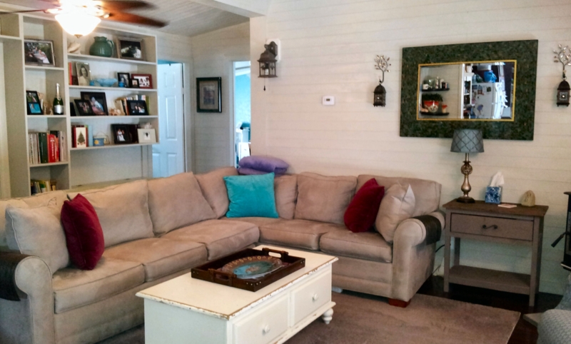 Cozy Mobile Home Living Room with Tan Sectional & Built-ins