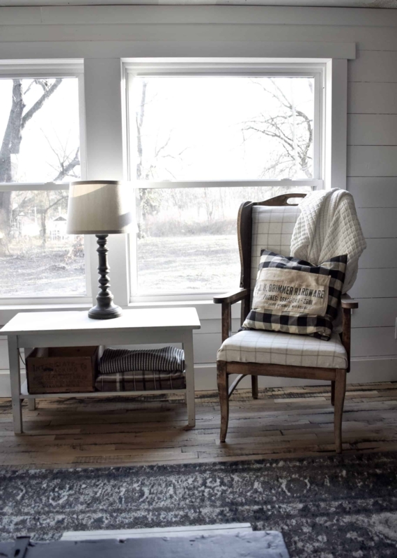 Cozy Rustic Reading Nook with Wingback Silhouette Chair