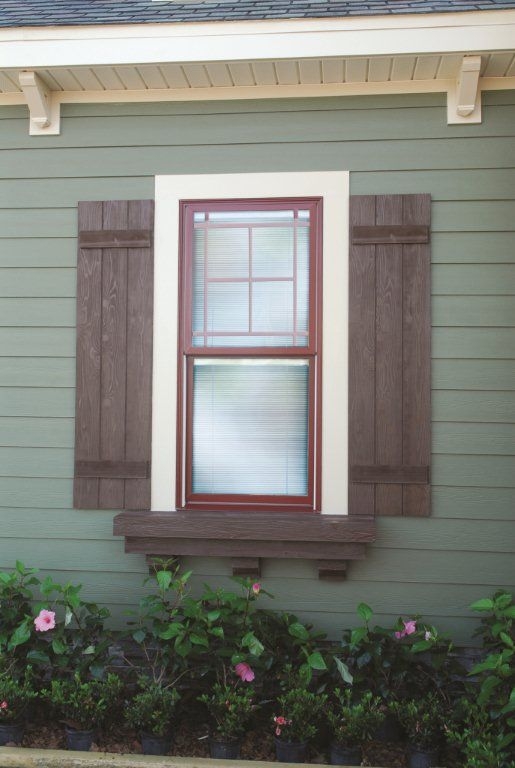 Craftsman Exterior with Sage Green Siding and Deep Red Window Frame