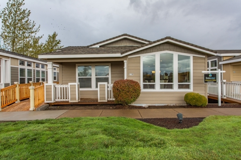 Craftsman Home Taupe Siding Large Windows White Porch Railing