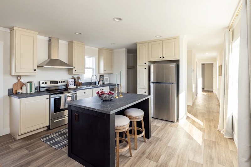 Cream Cabinets with Dark Countertops: Modern Farmhouse Island Contrast