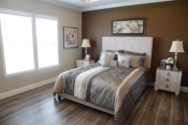 Cream Tufted Headboard Styling against Brown Accent Wall Bedroom Ideas