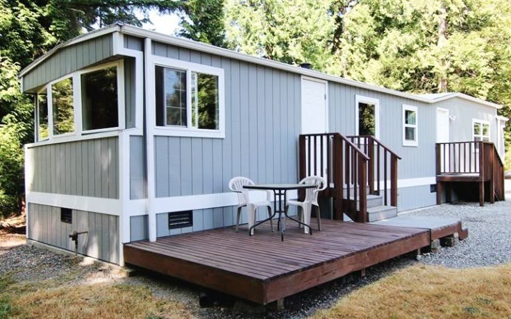 Deck with Dark Stain Finish set against a Forest Backdrop