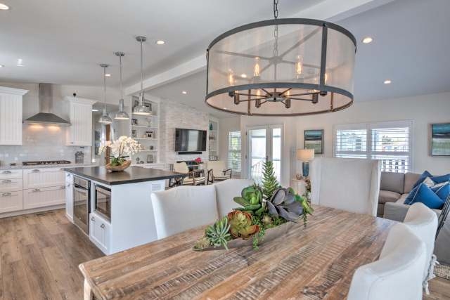 Dining Room with Rustic Wood Table and Oversized Drum Chandelier