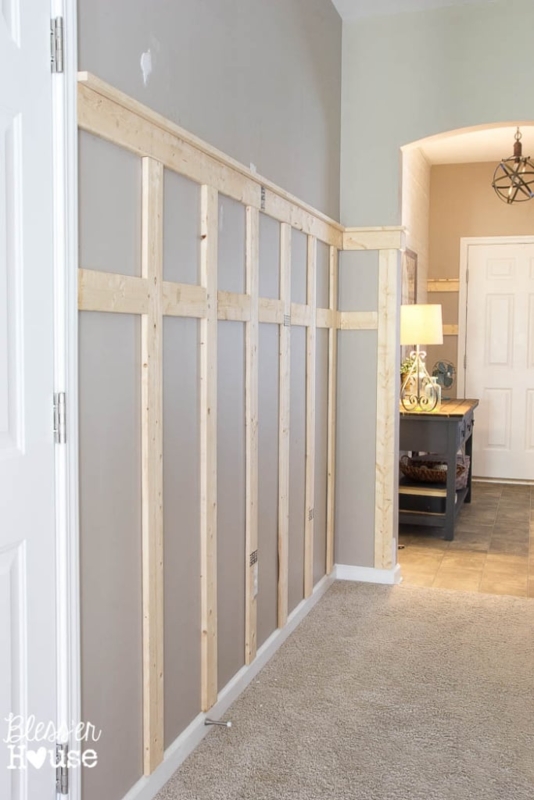 DIY Board and Batten Hallway with Unfinished Wood Grid over Grey Walls