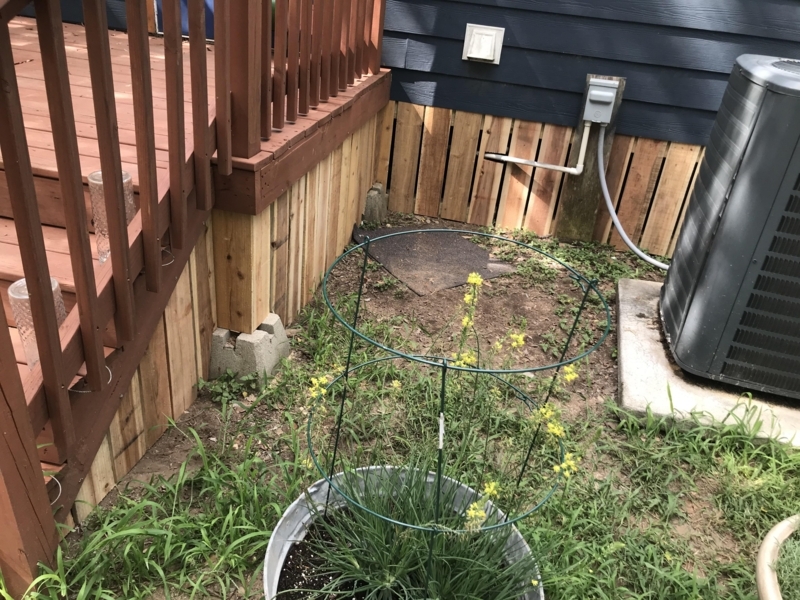 DIY Vertical Wood Slat Skirting on Blue-Gray Home