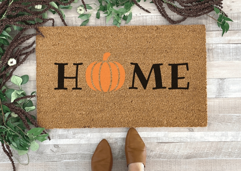 Doormat, "HOME" with Pumpkin Graphic, Serif Typography, Coir Texture