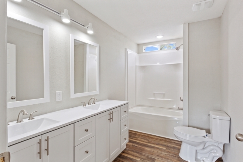 Double Vanity Bathroom with White Shaker Style Cabinets