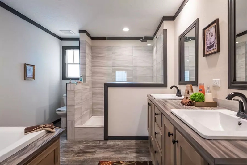 Double Vanity featuring Dark Contrast Molding and Wood Grain Tiles