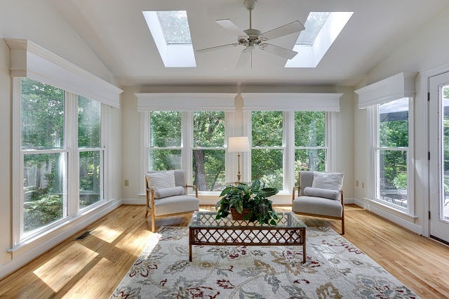 Dual Rectangular Skylights: Bright Sunroom, Vaulted Ceiling