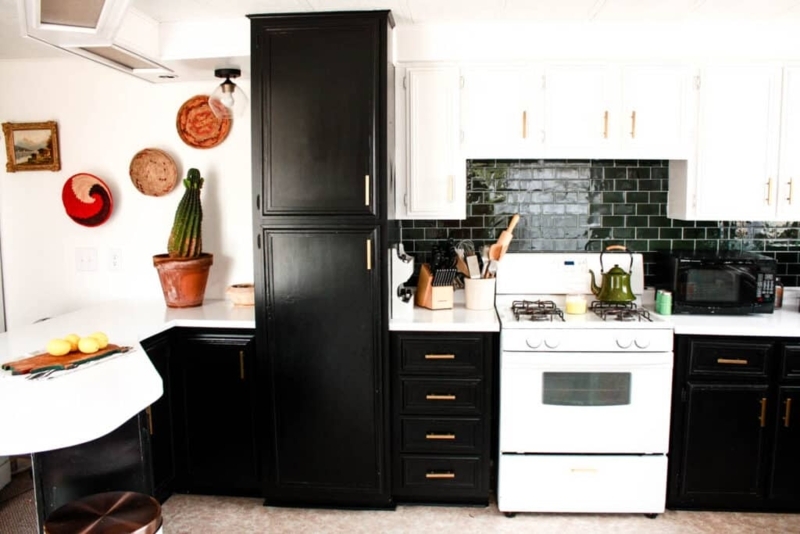 Eclectic Mobile Home Kitchen: Black and White Cabinets, Green Tile