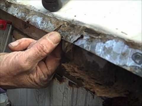 Exterior Trim Detail showing Rusted Metal and Wood Rot Corrosion