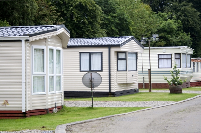 Exterior View of Mobile Home Park with Uniform Beige Vinyl Siding