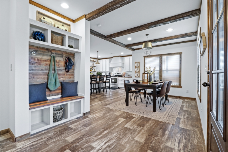 Farmhouse Mudroom Storage Ideas with Integrated Bench and Rustic Flooring