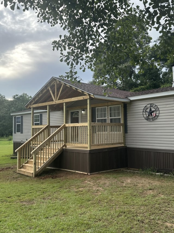 Front Porch with Gabled Roof and Rustic Truss Detail