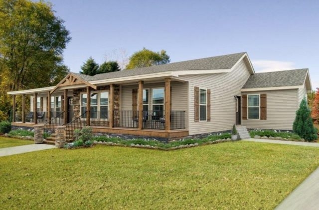 Front Porch with Stone Skirting on Craftsman Ranch Home Exterior