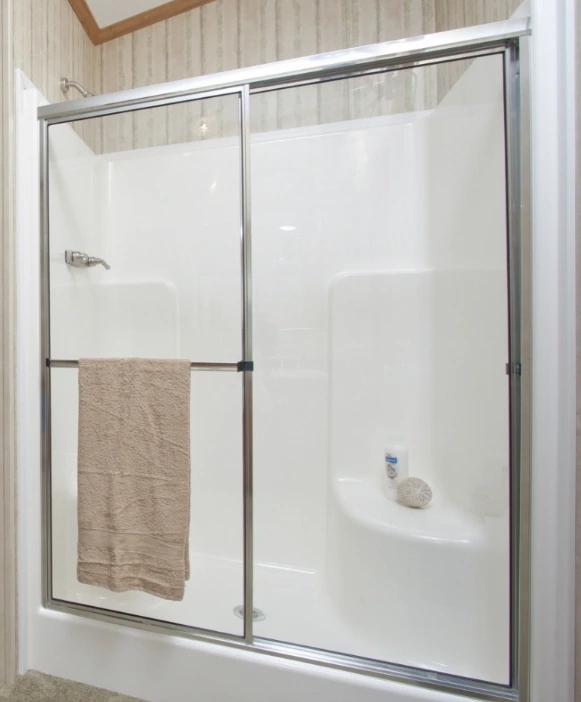 Functional Shower Stall: White Acrylic Walls with Integrated Seat